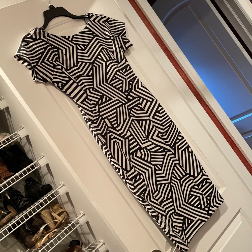 Below knee dress black and white in color